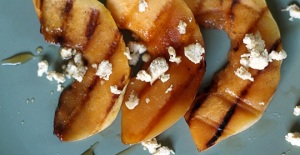 Grilled Cardamom Cantaloupe with Swiss Cheese Crumbles