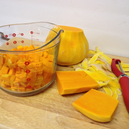 preparing butternut sqaush for Roasted Butternut Squash and Sausage with Gluten Free Penne Pasta