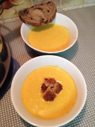 Creamy Pumpkin Soup topped with Brown Sugar Cinnamon Cruotons or a bowl soup with olive bread