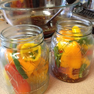 mini sweet peppers in jar waiting for brine
