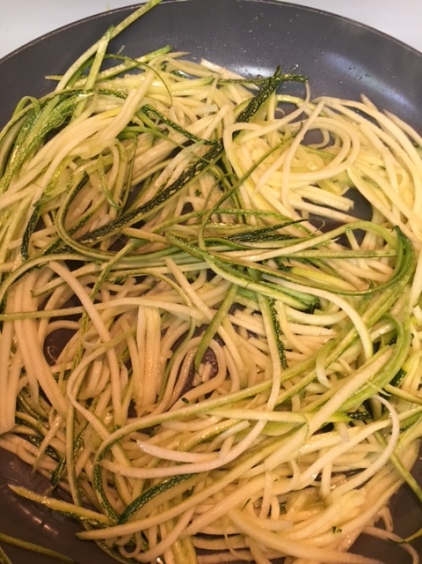 cooking squash pasta in skillet