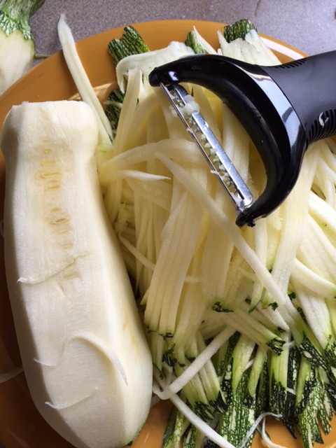 makng squash pasta with a julienne peeler