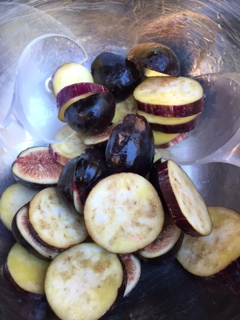 olive oil coated sliced eggplant and figs