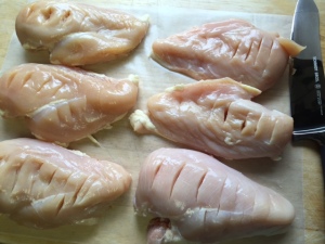 slits cut into chicken breasts